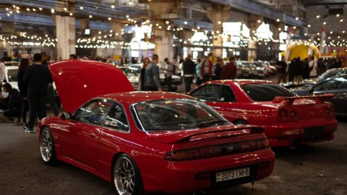 Stunning Red Nissan Silvia S14 and Skyline R34 JDM Car Meet Desktop Wallpaper