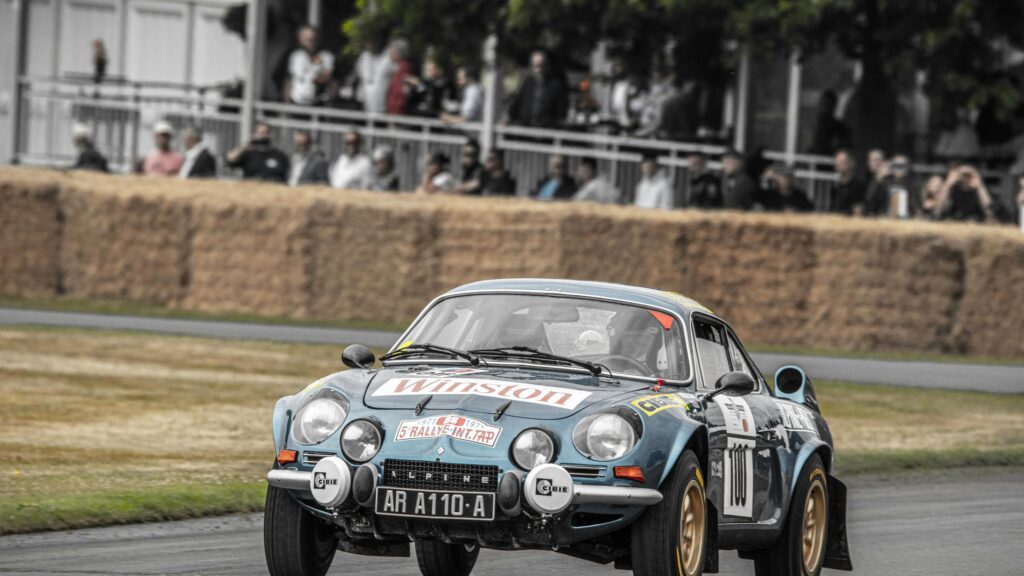 Vintage Alpine A110 Rally Car Racing on Track Desktop Wallpaper