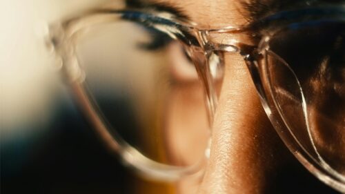 Macro Cinematic Close Up of Clear Eyeglasses Desktop Wallpaper