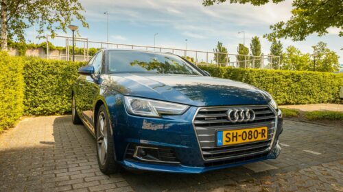 Blue Audi A4 Quattro Station Wagon Parking Outdoor 4K Wallpaper