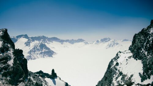 Breathtaking Snowy Mountain Peak Crater 4K Wallpaper