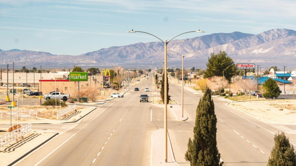 Desert Town Road at Sunset with Mountain View 4K Wallpaper