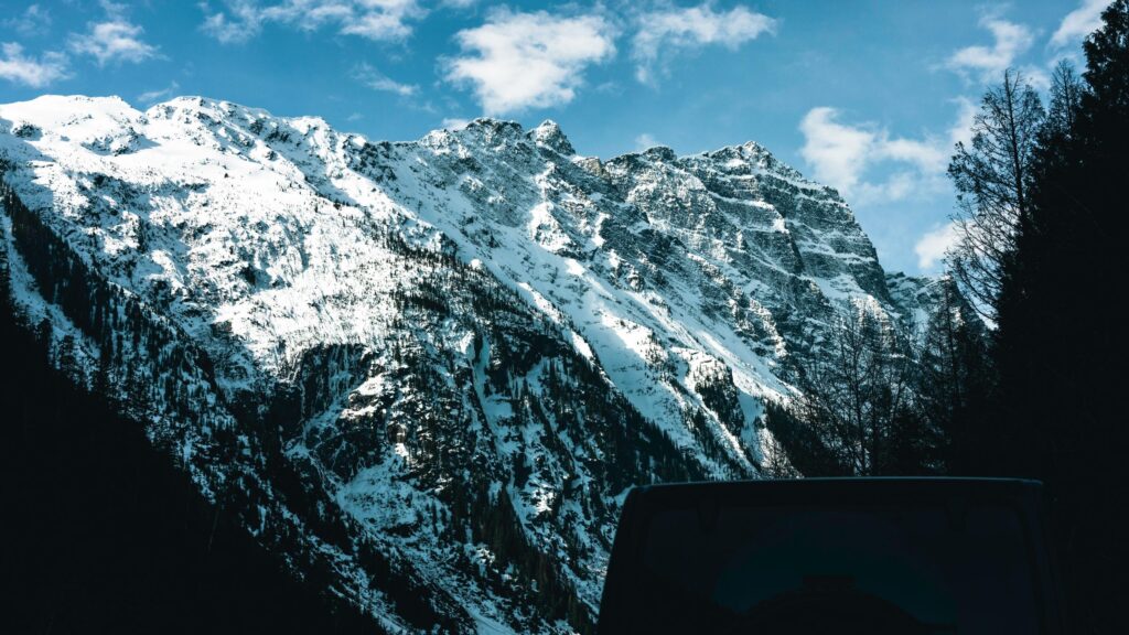 Snow Covered Rocky Mountains Peak Scenic Landscape 4K Wallpaper