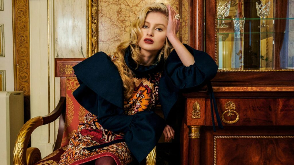 Elegant Blonde Model in Royal Interior 4K Desktop Wallpaper