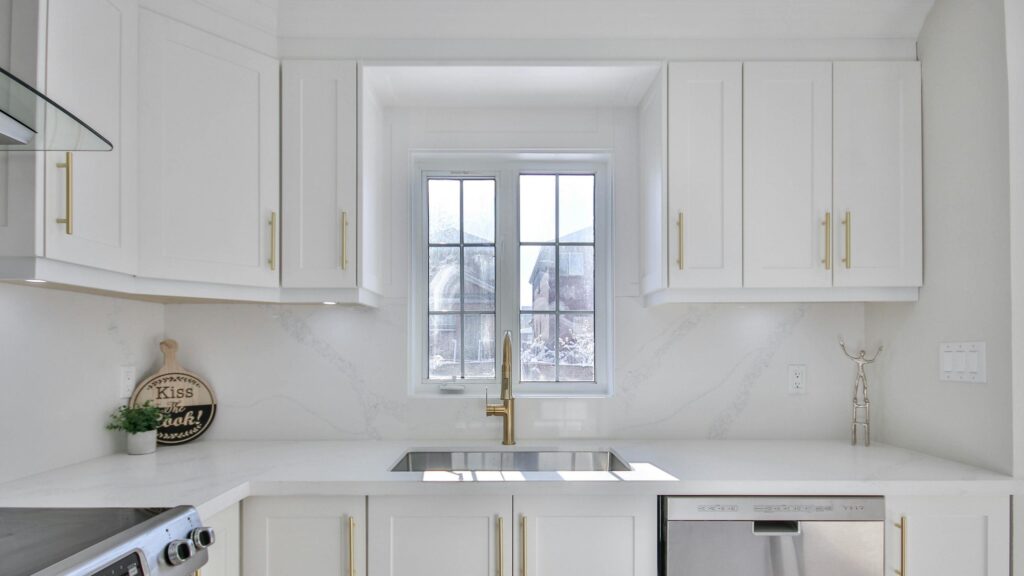 Modern White Kitchen Interior with Gold Accents 4K Desktop Wallpaper