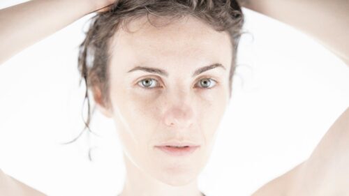 Portrait of a Beautiful Young Woman with Natural Makeup 4K Wallpaper