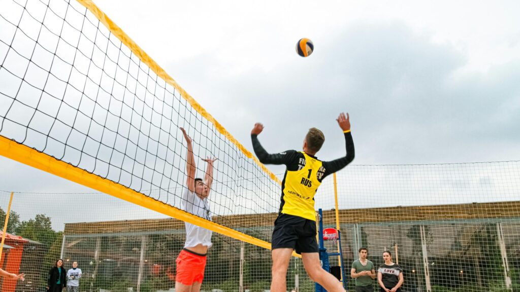 Action Volleyball Players at the Net Sports 4K Wallpaper