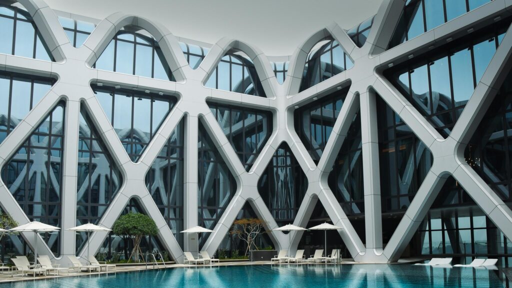 Modern Luxury Hotel Pool with Geometric Architecture 4K Wallpaper