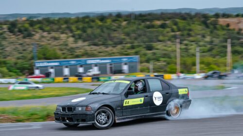 BMW Drift Car Racing on Track 4K Desktop Wallpaper