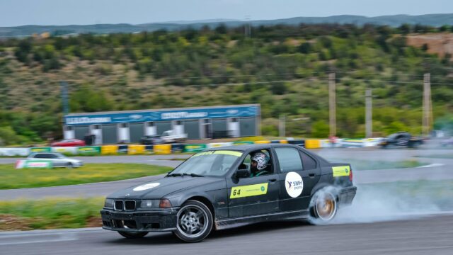 BMW Drift Car Racing on Track 4K Desktop Wallpaper
