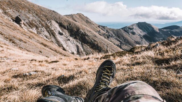 Stunning Mountain Hiking View with Tactical Boots Desktop Wallpaper