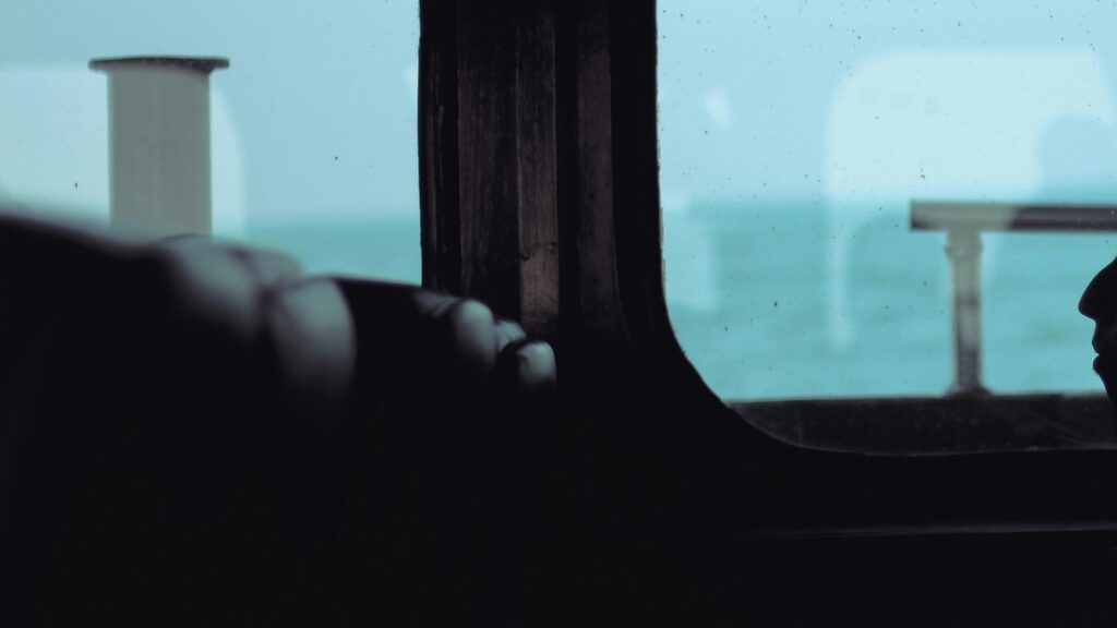 Moody View from a Ship Window Over the Ocean 4K Wallpaper