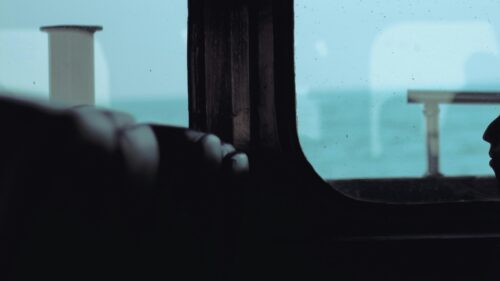 Moody View from a Ship Window Over the Ocean 4K Wallpaper