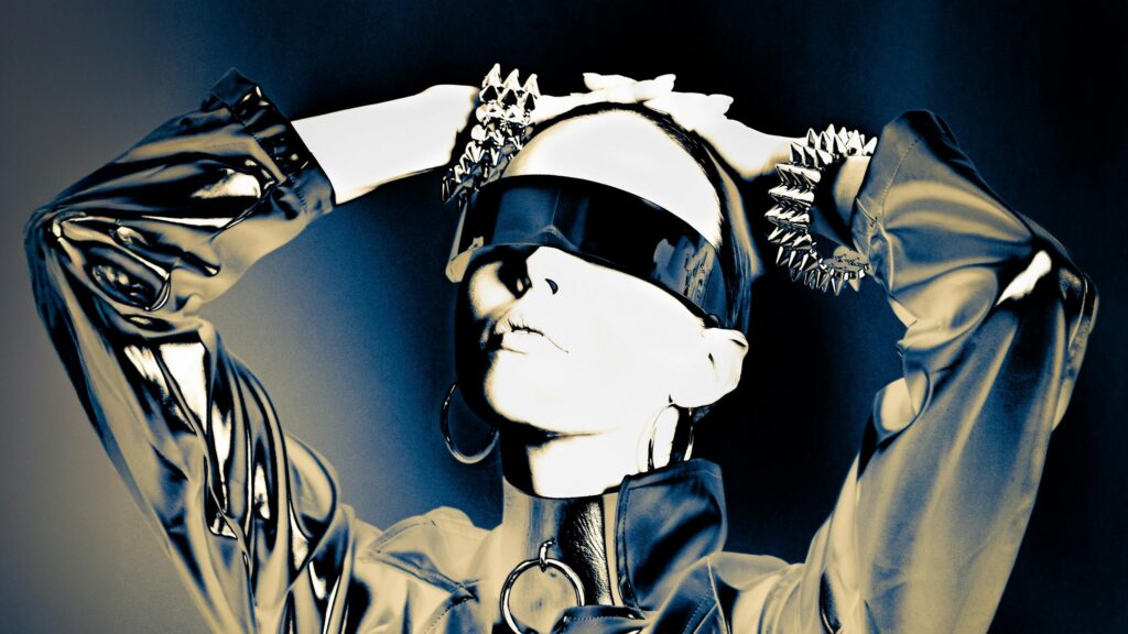 Futuristic Cyberpunk Woman in Spiked Accessories 4K Desktop Wallpaper
