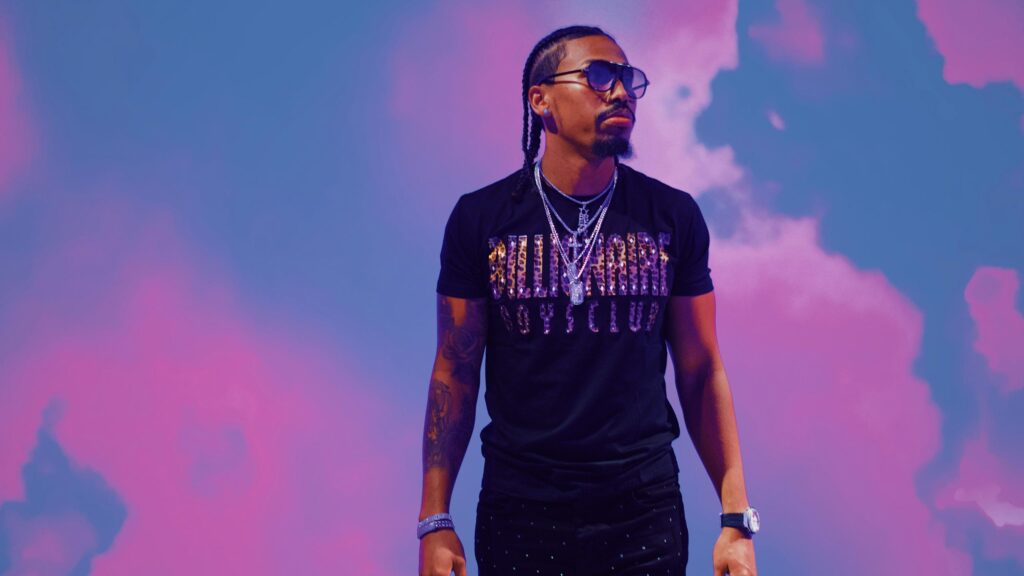Stylish Man with Braids Wearing Sunglasses 4K Desktop Wallpaper