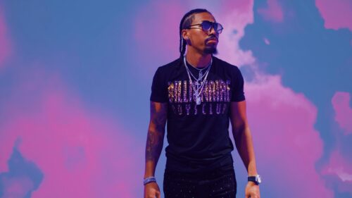 Stylish Man with Braids Wearing Sunglasses 4K Desktop Wallpaper
