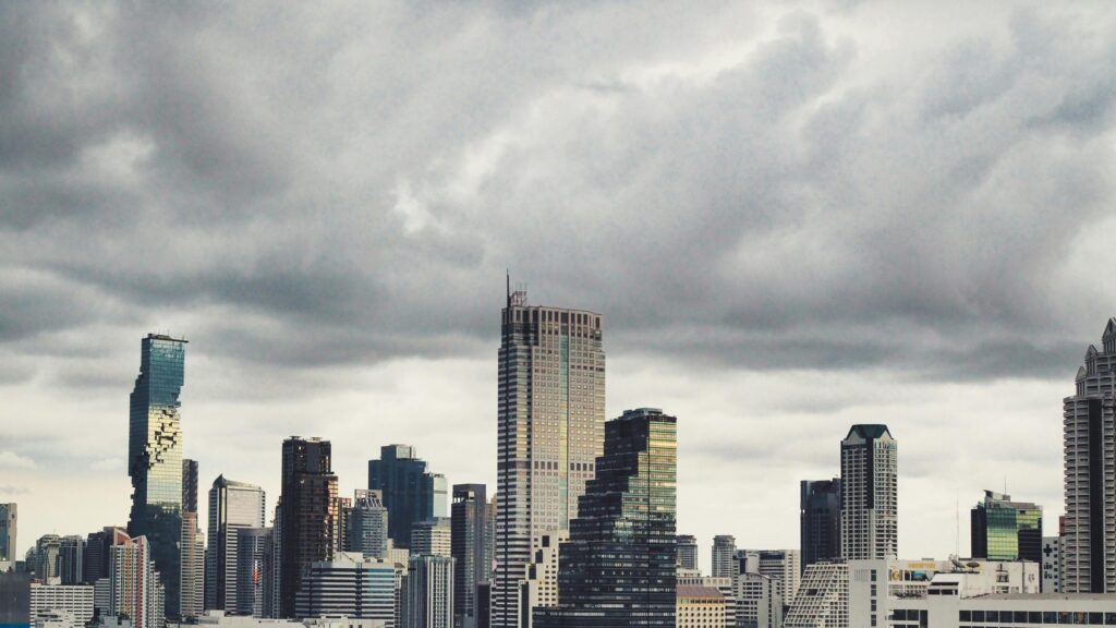 Bangkok Skyline Cityscape with Dramatic Cloudy Sky 4K Desktop Wallpaper