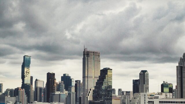 Bangkok Skyline Cityscape with Dramatic Cloudy Sky 4K Desktop Wallpaper