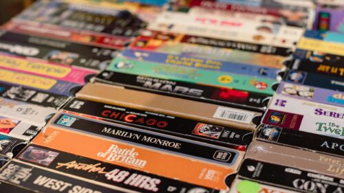 Retro Nostalgia Collection of Vintage VHS Tapes Desktop Wallpaper