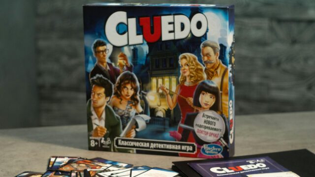 Clue Board Game Box and Cards Setup 4K Wallpaper