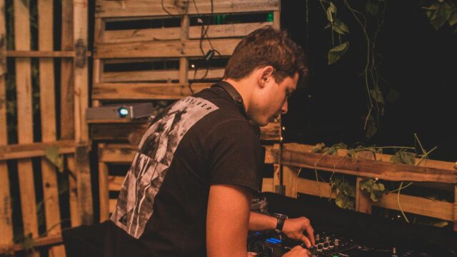DJ Playing Music at Night Party 4K Desktop Wallpaper