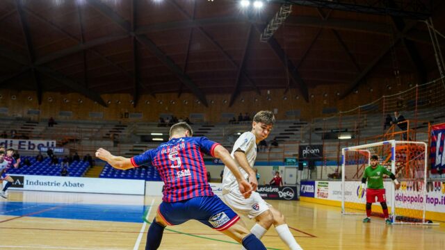 Intense Futsal Match Action Shot High Resolution Desktop Wallpaper