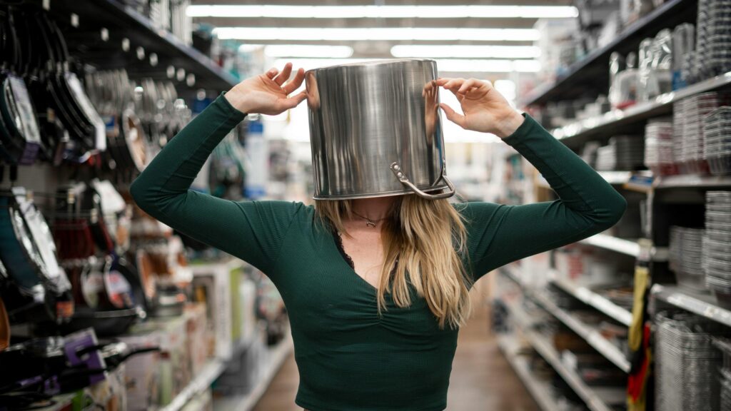 Funny Woman With A Metal Pot On Her Head Desktop Wallpaper