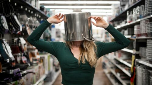 Funny Woman With A Metal Pot On Her Head Desktop Wallpaper