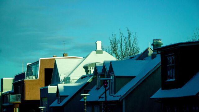 Snow Covered Scandinavian Houses Winter Sunset 4K Desktop Wallpaper