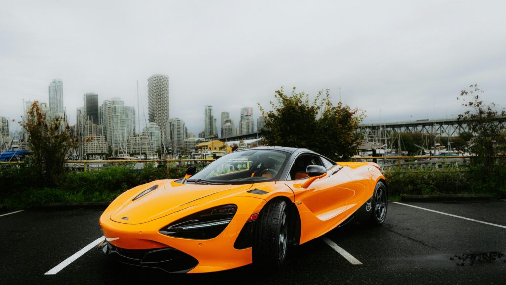 McLaren 720S Supercar in Vancouver Cityscape Desktop Wallpaper