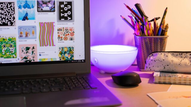 Cozy Creative Workspace with Laptop and Stationery 4K Wallpaper