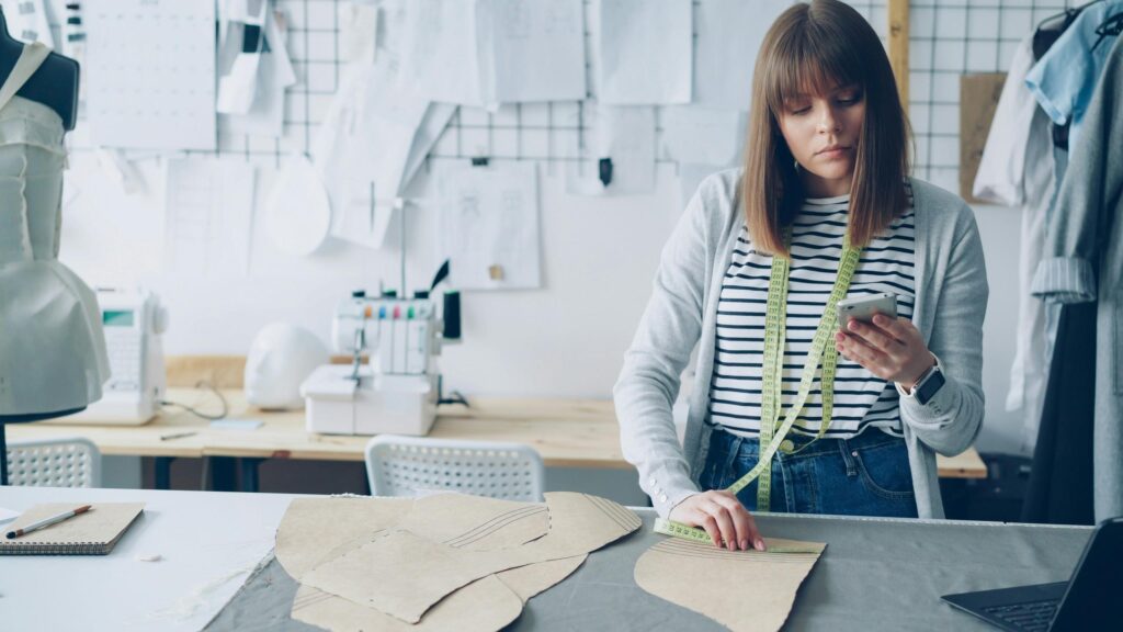 Creative Fashion Designer Working in Studio Desktop Wallpaper