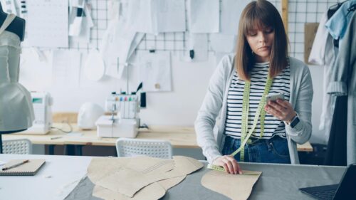 Creative Fashion Designer Working in Studio Desktop Wallpaper