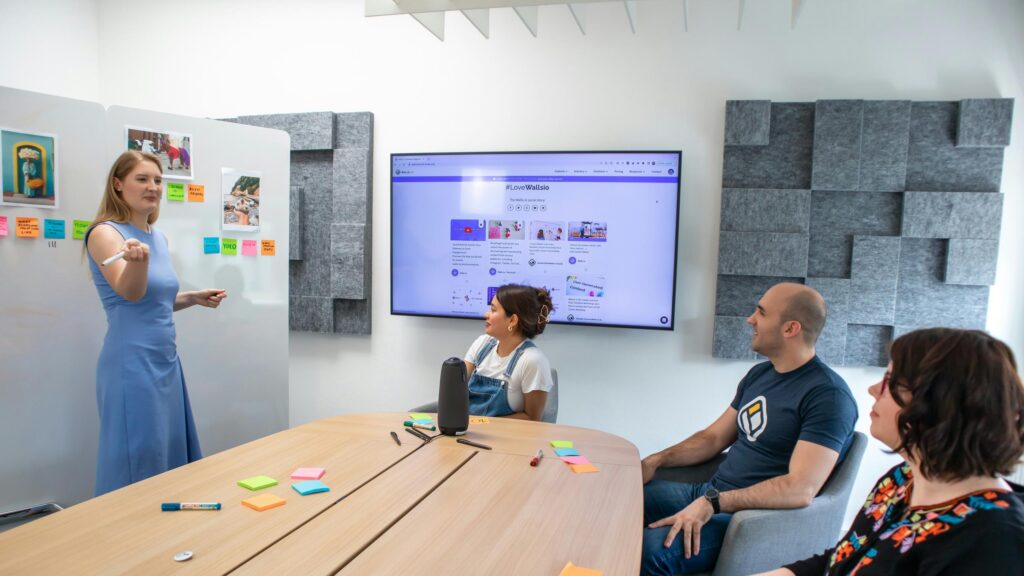 Business Team Brainstorming in Modern Office Meeting 4K Desktop Wallpaper