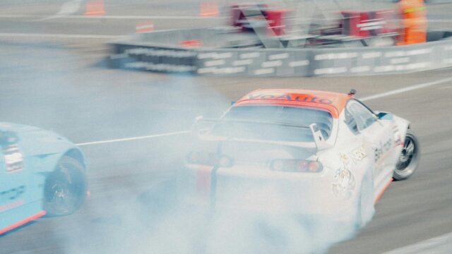 Drifting Toyota Supra and Sports Car Racing 4K Wallpaper