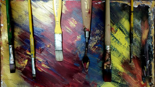 Artistic Palette with Paintbrushes and Palette Knife 4K Wallpaper
