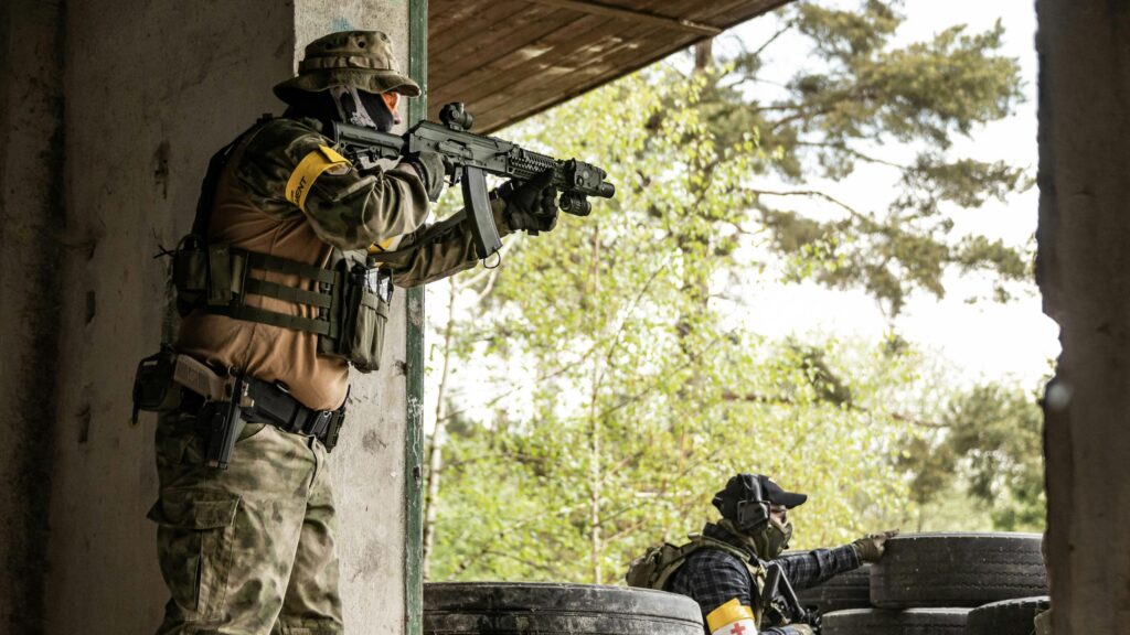 Tactical Airsoft Combat Team in Action Desktop Wallpaper