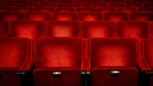 Empty Red Velvet Cinema Theater Seats 4K Desktop Wallpaper