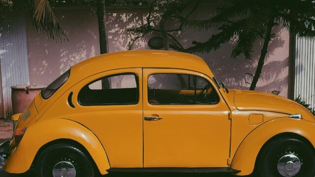 Vibrant Yellow Vintage Volkswagen Beetle Car Desktop Wallpaper