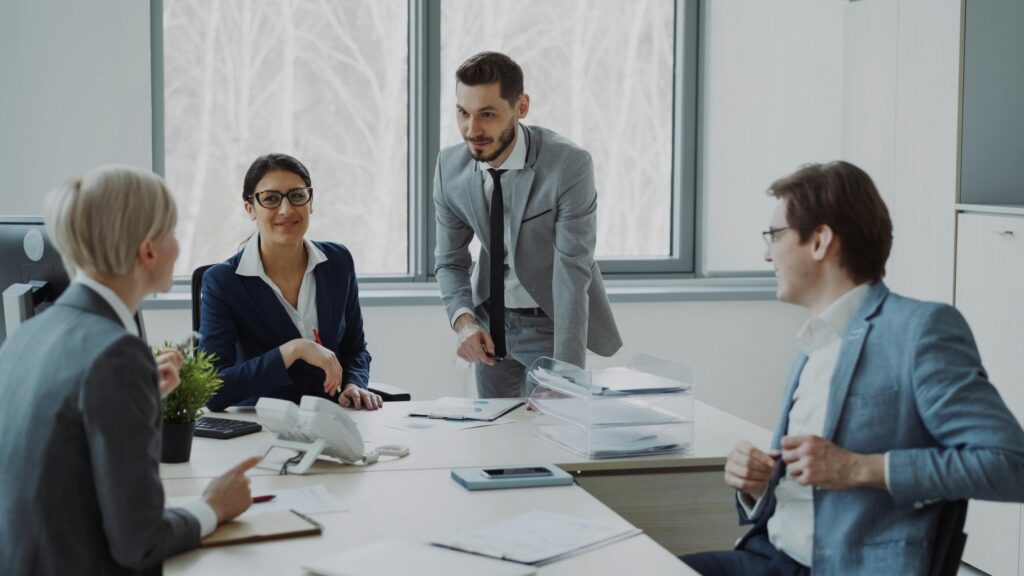 Professional Business Meeting in Modern Office Desktop Wallpaper