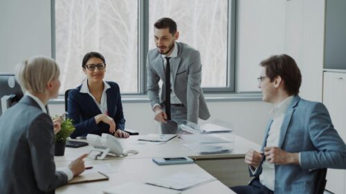 Professional Business Meeting in Modern Office Desktop Wallpaper