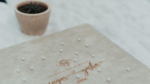 Elegant Pre-Wedding Photo Album with Pearl Accents Desktop Wallpaper