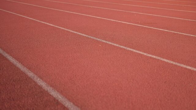 Red Running Track Lines Texture Sports Field 4K Desktop Wallpaper