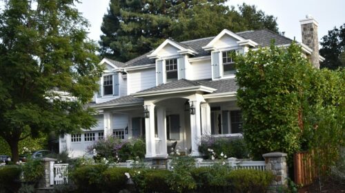 Charming Suburban White House with Garden 4K Desktop Wallpaper