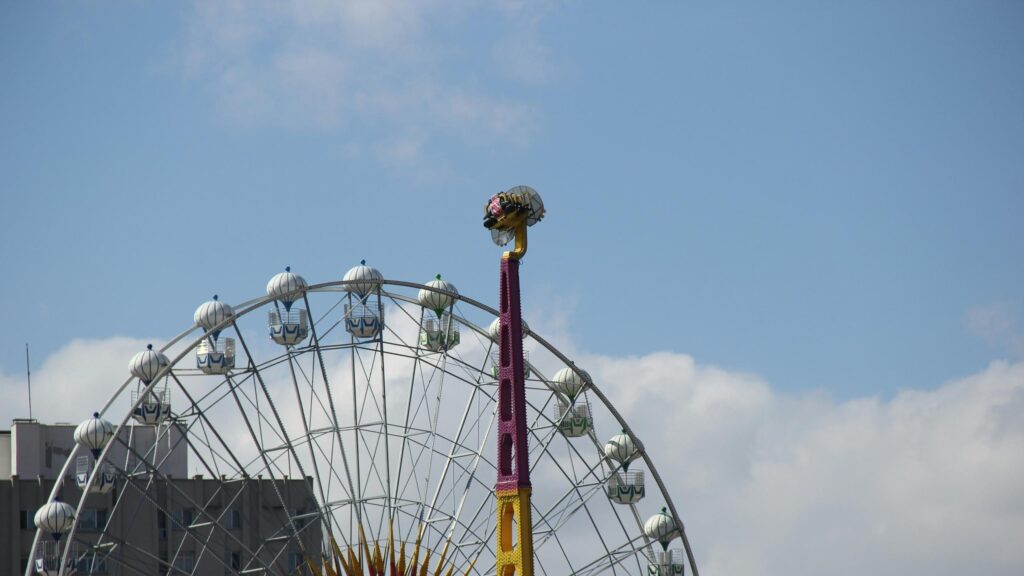 Thrilling Fairground Ferris Wheel and Drop Tower Amusement Park PC Wallpaper