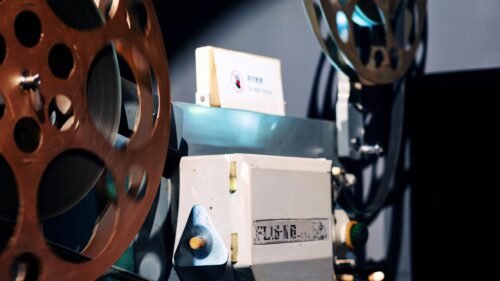 Vintage Cinematic Film Projector Mechanism 4K Wallpaper