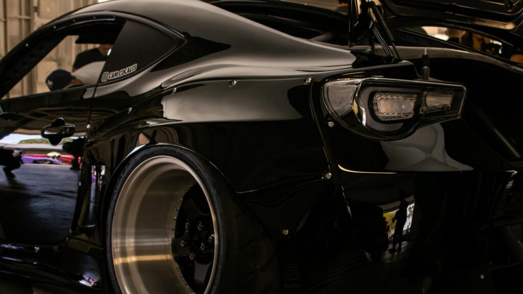 Modified Black JDM Sportscar Widebody Rear Profile 4K Wallpaper