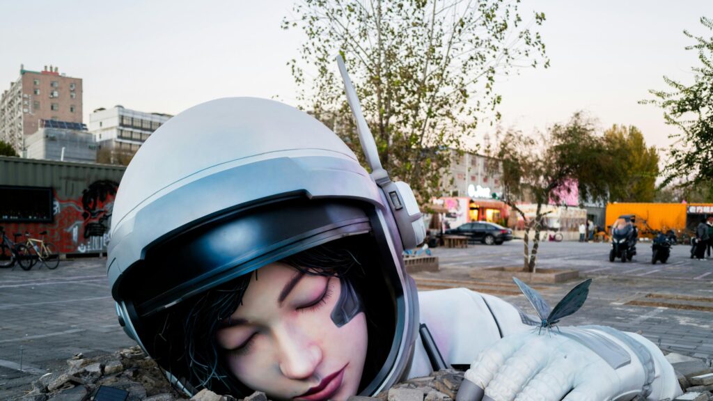 Astronaut Statue with Butterfly Surreal Art 4K Desktop Wallpaper