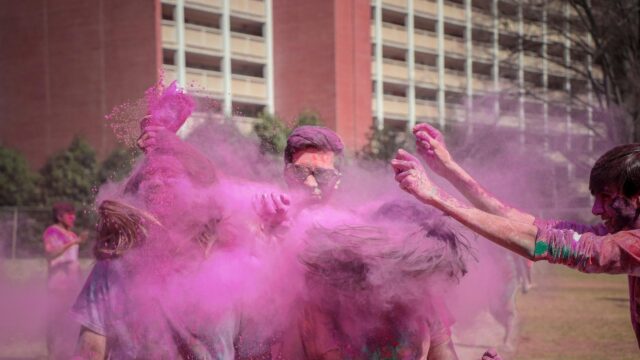 Vibrant Holi Festival Celebration Pink Powder Explosion 4K Wallpaper