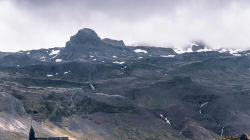 Stunning Icelandic Mountain Landscape with Cascading Waterfalls 4K Wallpaper